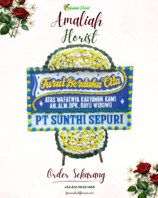 Papan Bunga Duka di Ujung Batung